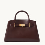 Atelier chocolate brown pebbled leather structured tote with gold bar clasp – front view