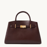 Atelier chocolate brown pebbled leather structured tote with gold bar clasp – front view