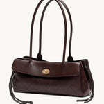 Fronde chocolate brown distressed leather shoulder bag with arc handles and tassel ties – side view