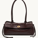 Fronde chocolate brown distressed leather shoulder bag with arc handles and tassel ties – front view